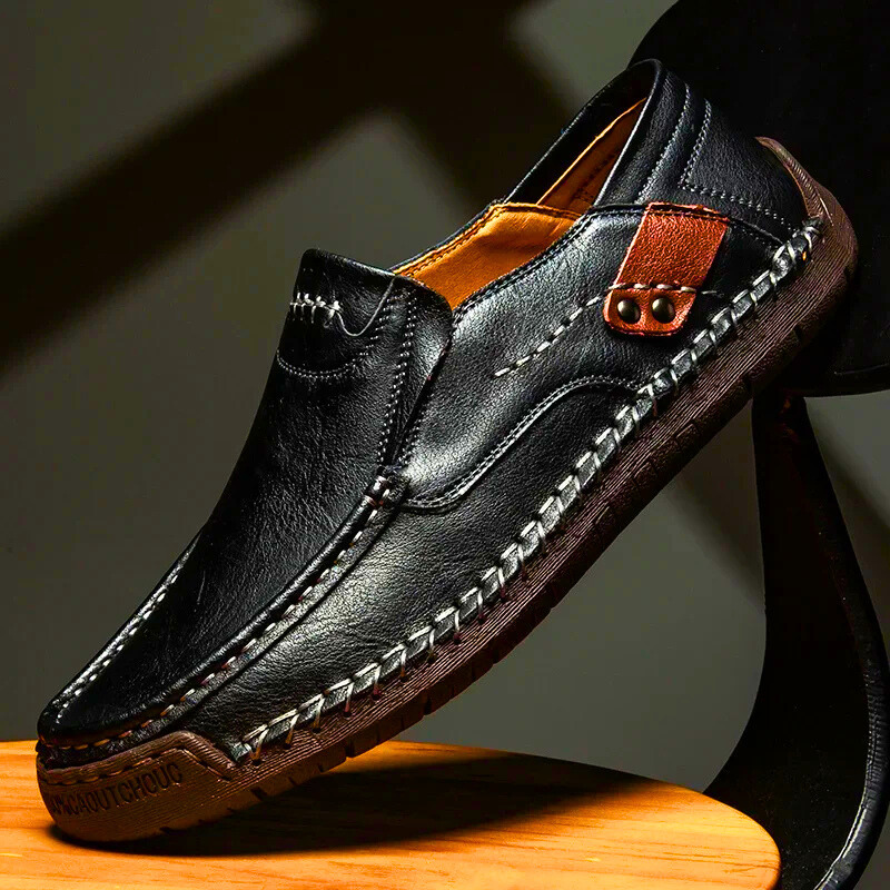 Refined men's brown slip-on loafers, elegant dress shoes for stylish everyday and formal occasions.