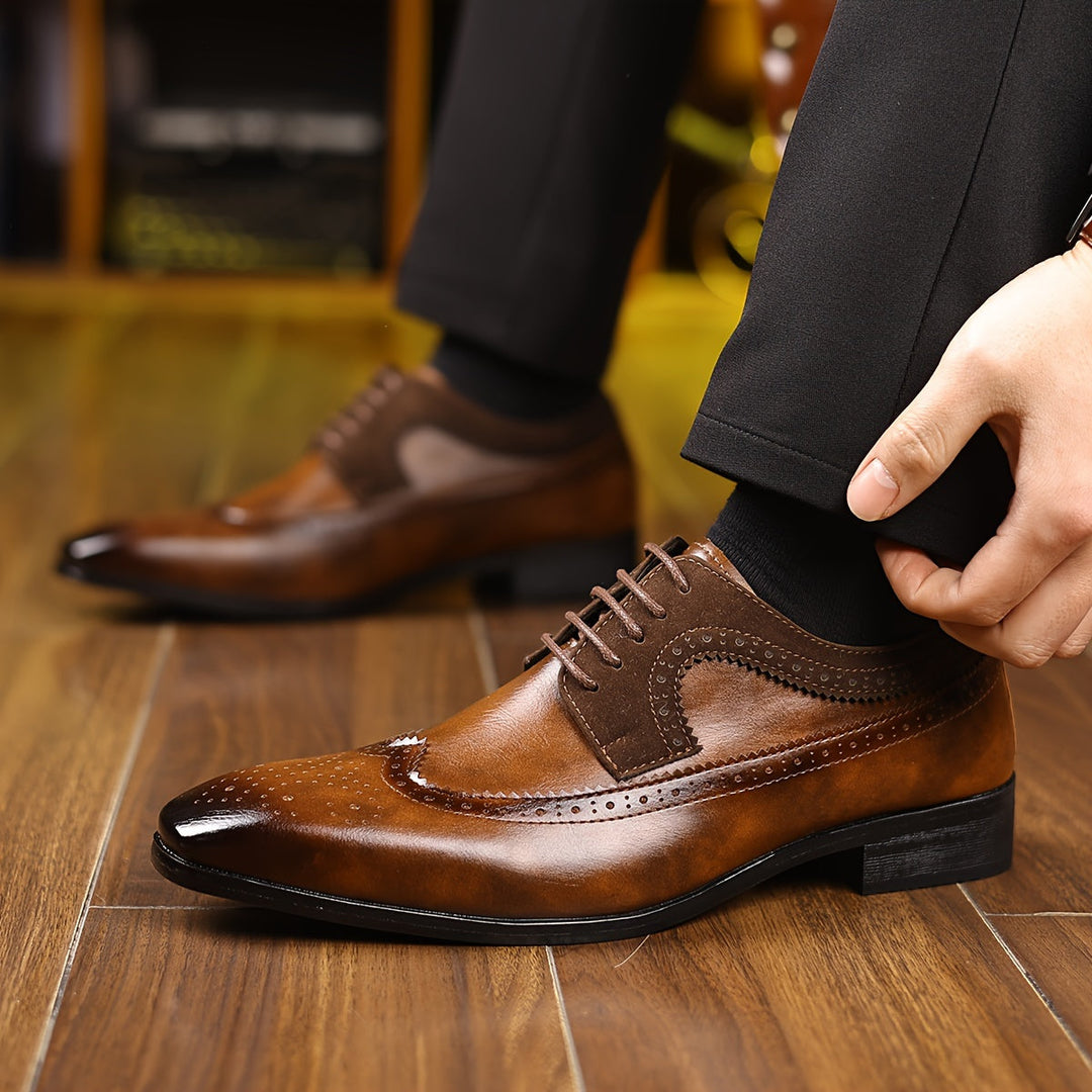 High-quality black leather men's Oxford brogue shoes, featuring traditional wingtip design and sturdy laces.