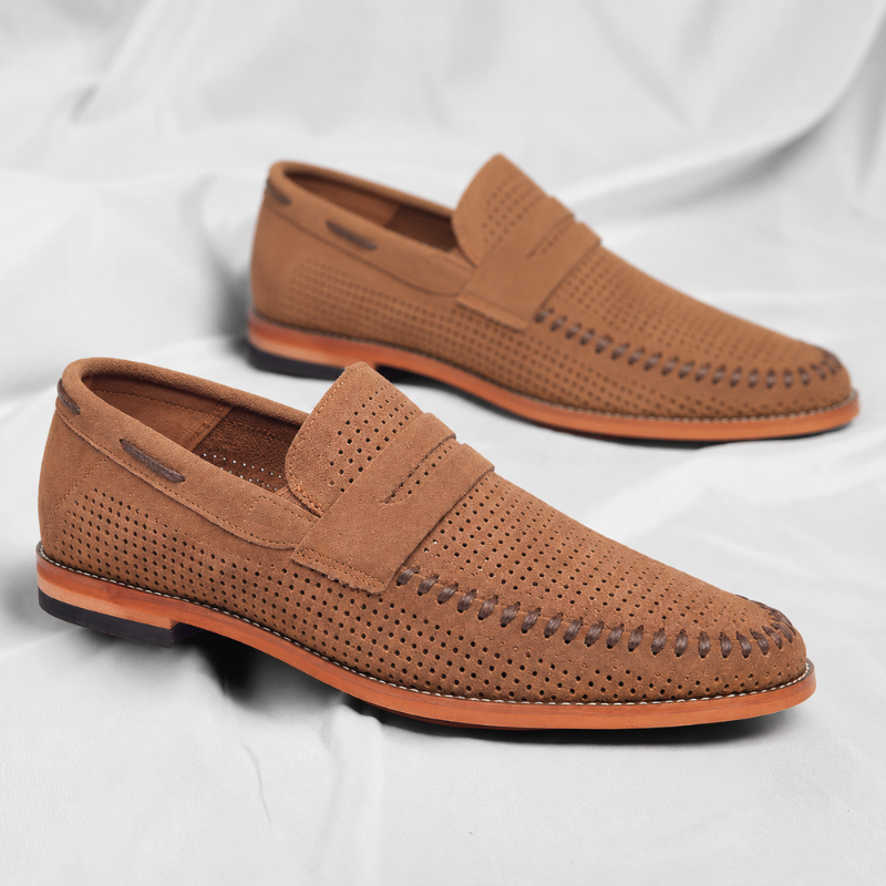 Sophisticated black slip-on penny loafers for men, ideal for versatile dress and casual outfits.
