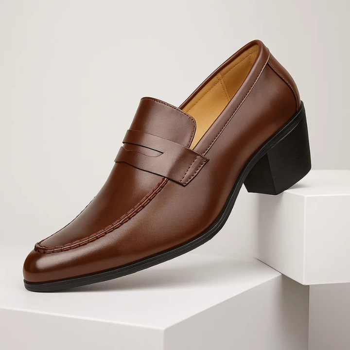Men's classic brown leather slip-on loafers, perfect for everyday elegance and comfort.