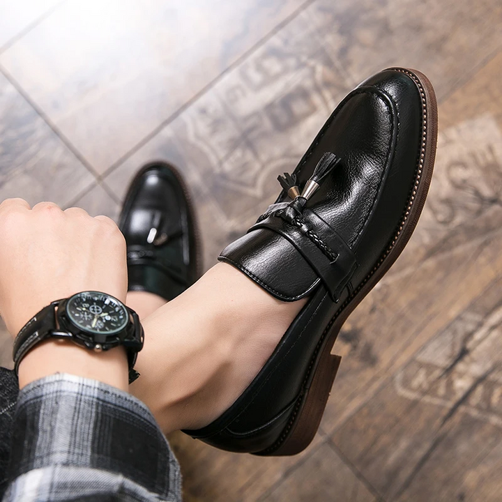 Men's comfortable dress shoes: tassel loafers designed for style and all-day wear at work or events.
