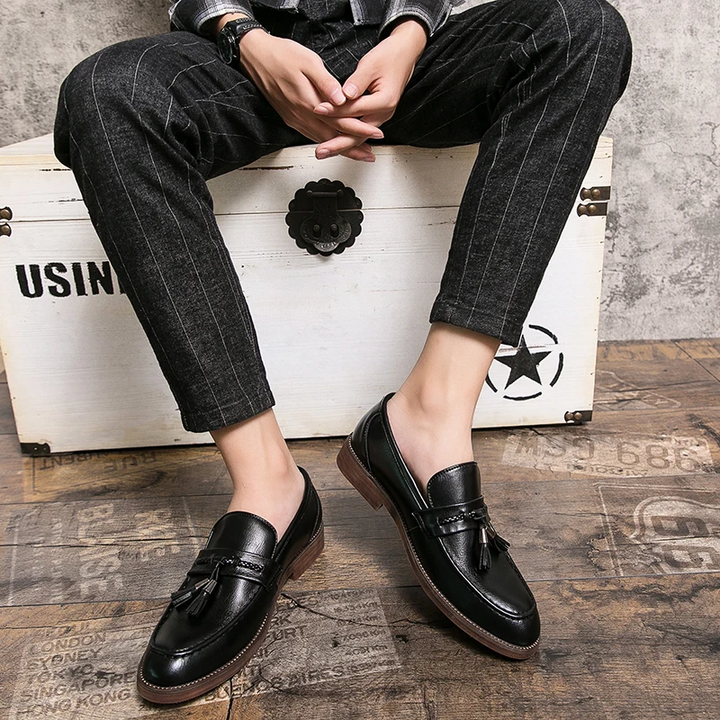 Timeless black men's tassel loafers, dress shoes that combine elegance with ultimate comfort.