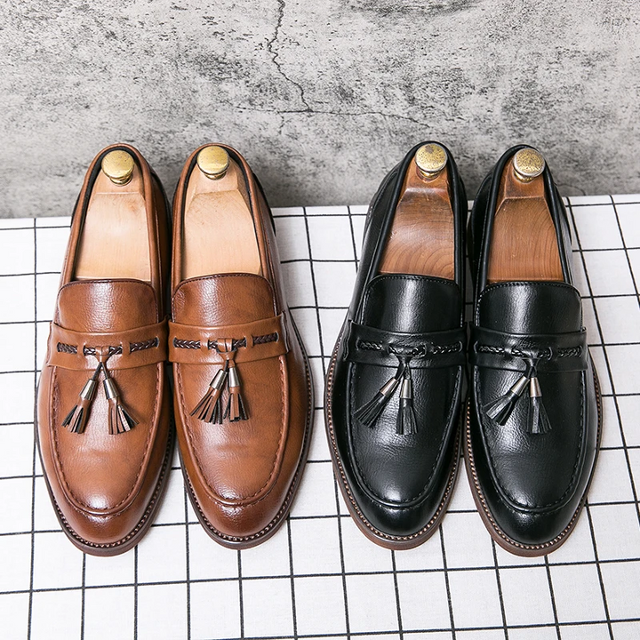 Men's classic leather tassel loafers, offering a polished style and all-day comfort for modern gentlemen.
