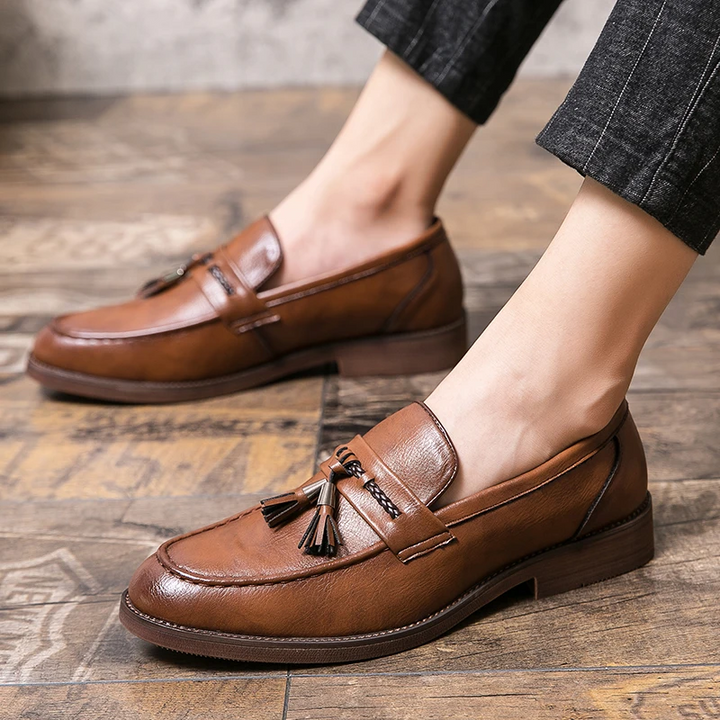 Elegant men's footwear: comfortable tassel loafers perfect for formal occasions or daily business.