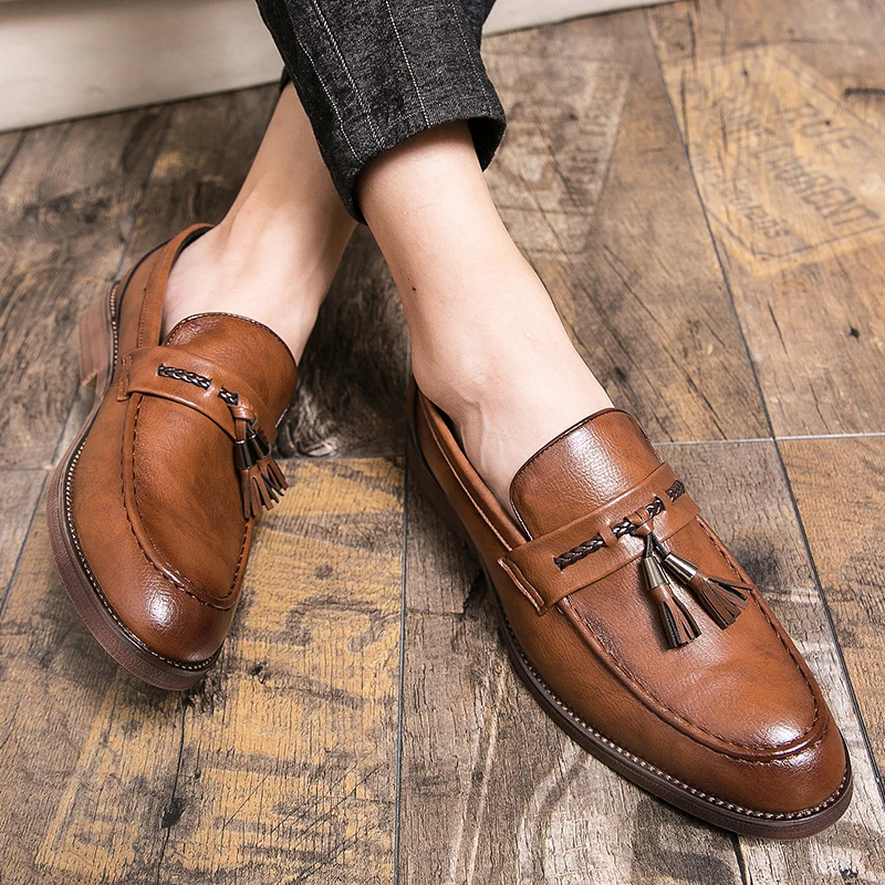 Stylish men's tassel loafers in rich leather, offering polished style & comfortable all-day wear.