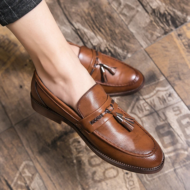 Comfortable slip-on men's tassel loafers, perfect dress shoes for formal events & daily office.