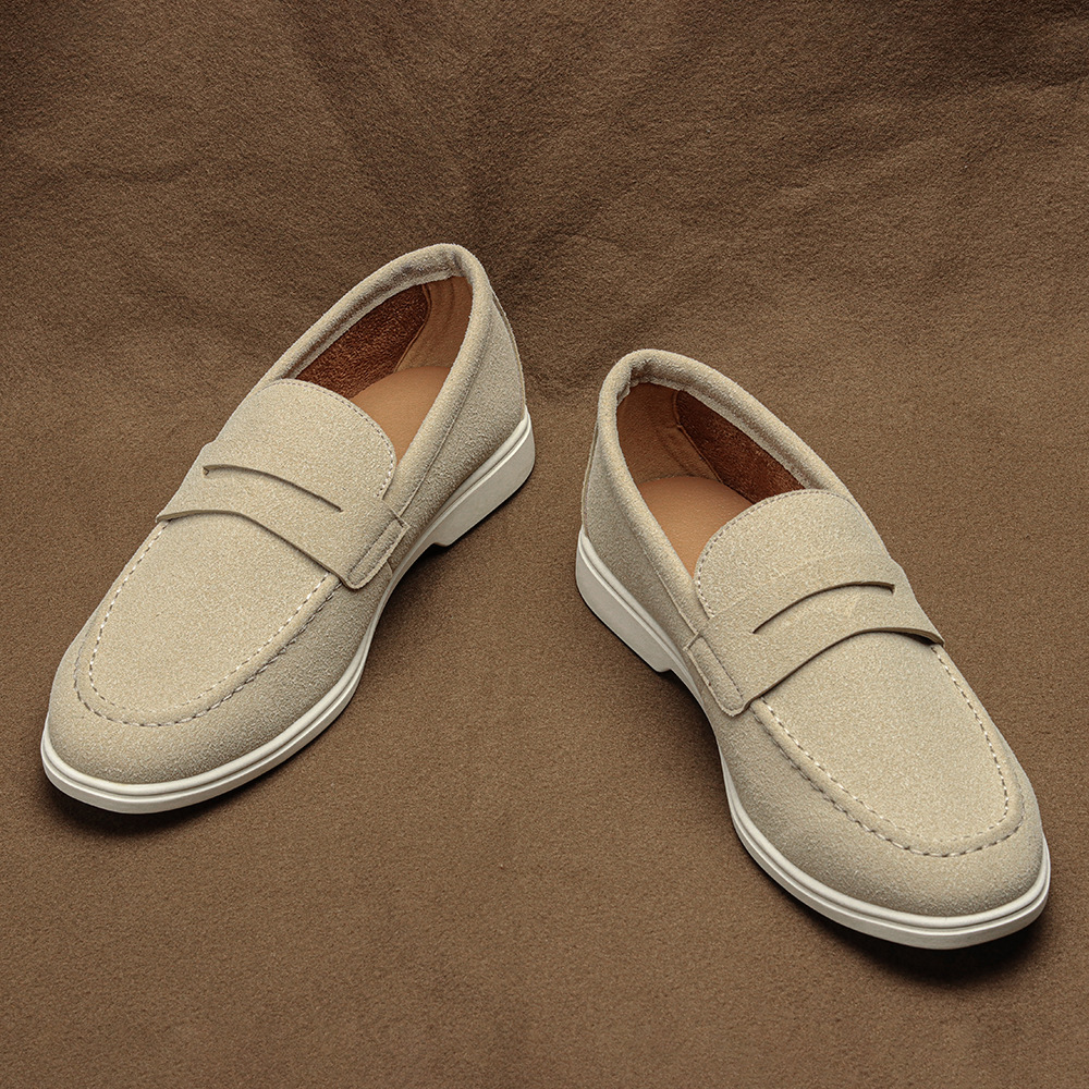 Versatile men's brown penny loafers, easy slip-on comfort shoes for diverse casual, office, or dressy occasions.