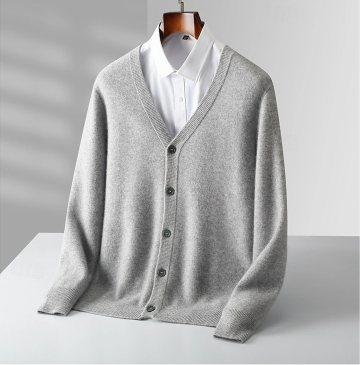 Timeless men's button-up knit cardigan for modern men. Comfortable and stylish long-sleeve knitwear.