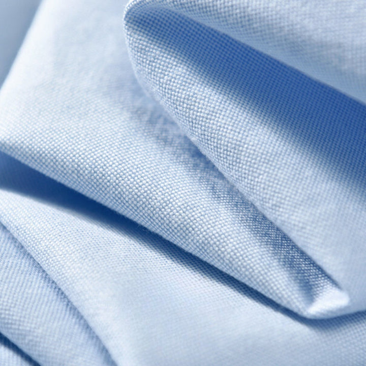 Everyday men's button-up shirt, classic long sleeve with chest pocket, offering versatile men's fashion.