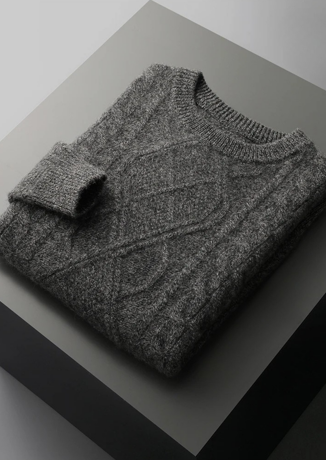 Cozy men's cable knit crew neck sweater. Classic winter style, warm knitwear for smart casual occasions.