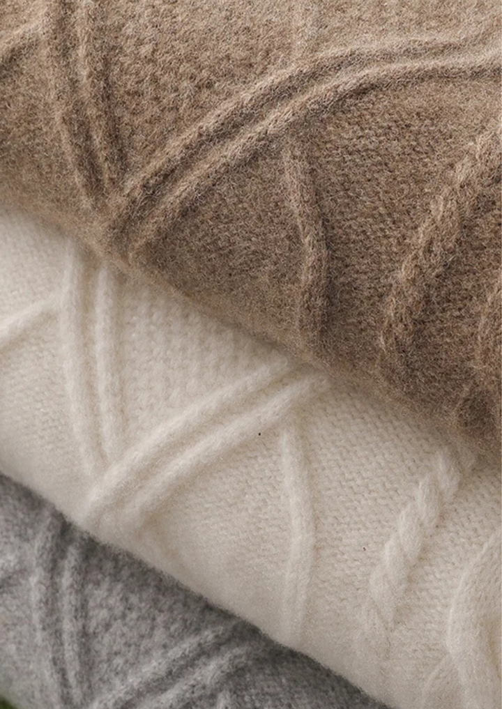 Classic men's cable knit sweater with crew neck. Essential winter fashion for a cozy, smart casual look.