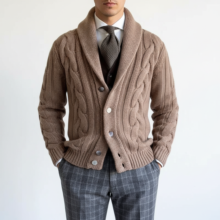 Close-up on the v-neckline of a men's classic cable knit vest, offering a sophisticated look