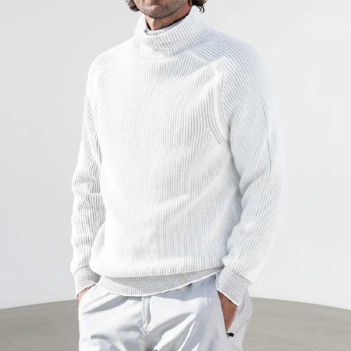 Detail of the ribbed cuff and hem on a men's elegant turtleneck sweater, high-quality winter fashion