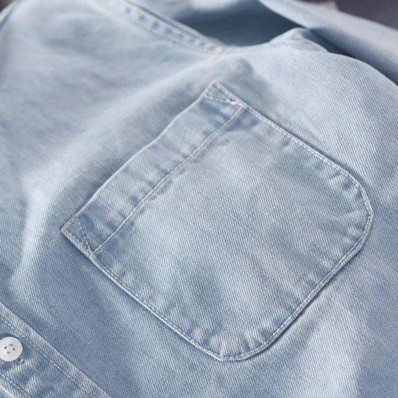 Everyday men's casual button-down shirt, a long sleeve top with a classic design for various occasions.