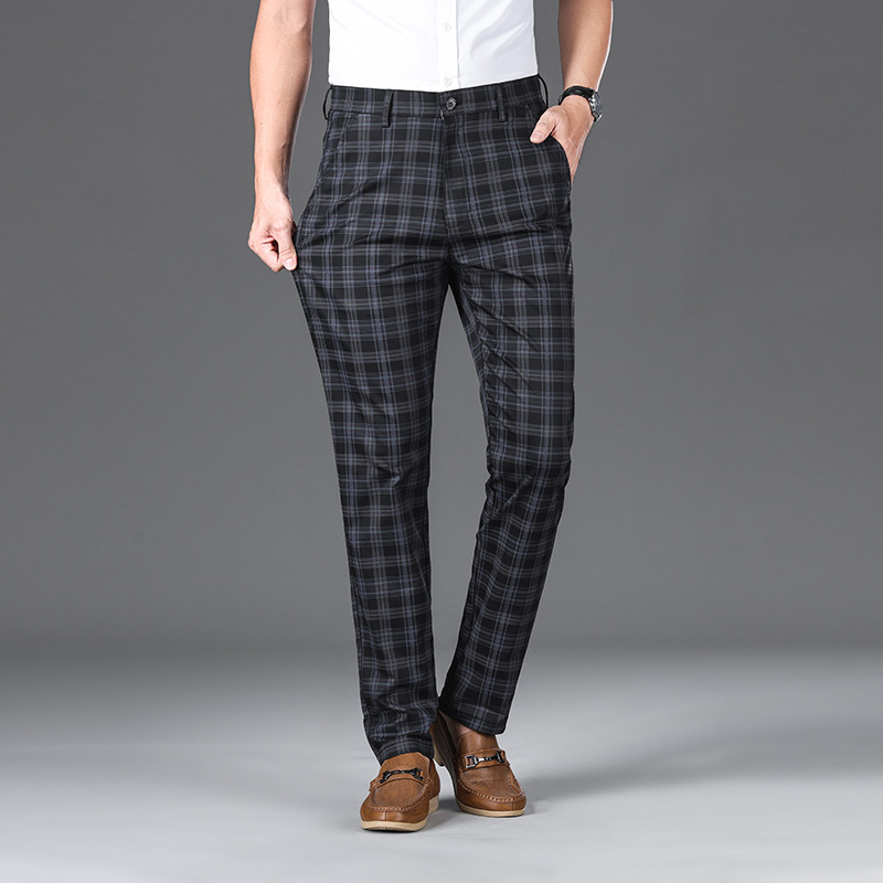 Stylish men's plaid trousers, classic check pattern. Perfect for smart casual outfits & modern men's fashion.