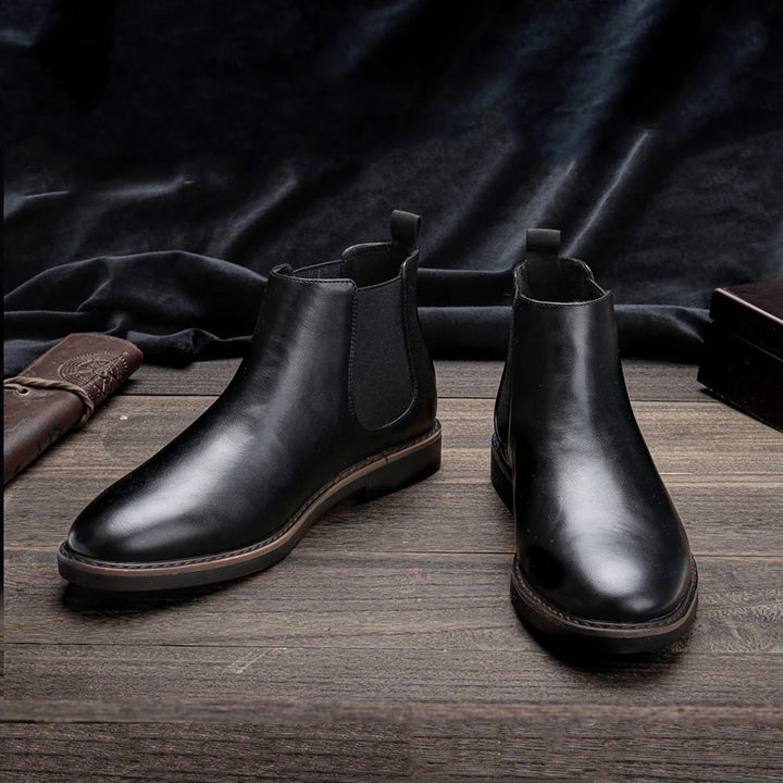 Men's Chelsea boots with jeans, casual urban style, comfortable & fashionable everyday wear for men.