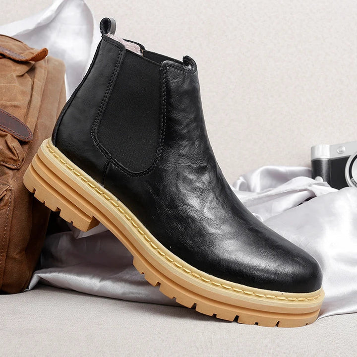 Modern gray men's Chelsea boots, comfortable ankle boots offering a versatile, classic casual style.