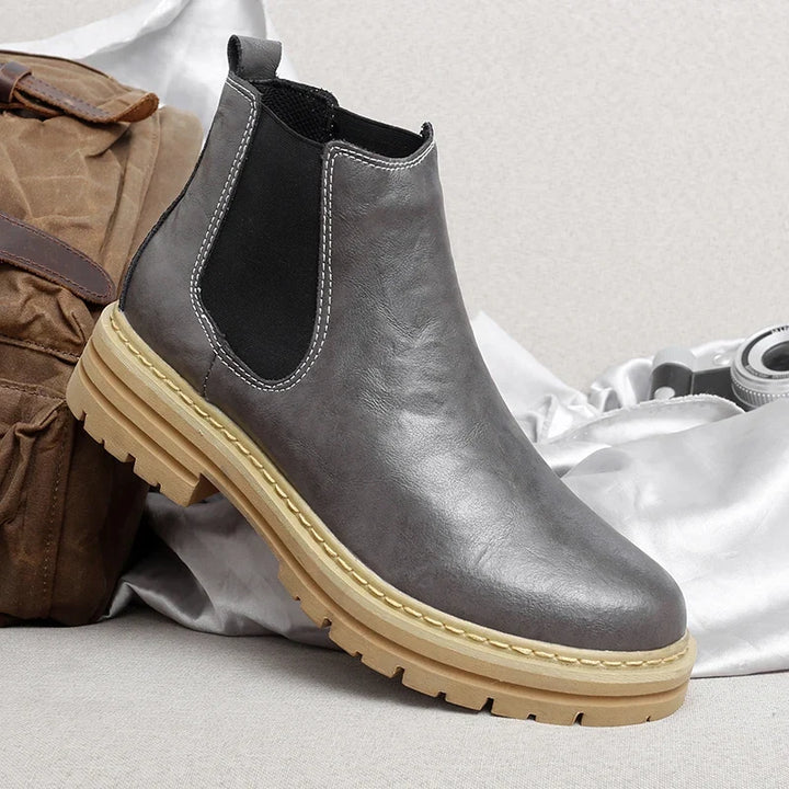 Sophisticated men's dress Chelsea boots, perfect for formal or business casual outfits; comfortable slip-on style.