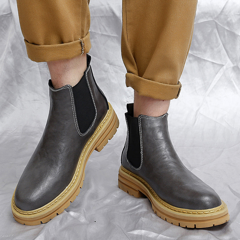 Back view of men's Chelsea boots, sturdy heel and comfortable design for everyday classic slip-on ankle boots.