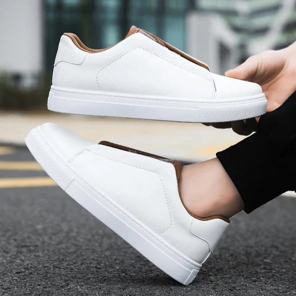 Comfortable men's Chelsea style sneakers with athletic-inspired sole. Perfect for modern casual footwear.