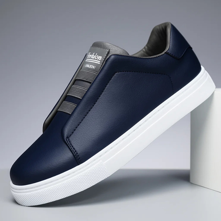 Stylish men's black Chelsea sneakers. Modern casual slip-on shoes for everyday wear, blending fashion & comfort.