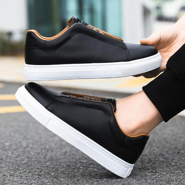 Men's contemporary Chelsea sneakers with elastic goring for easy slip-on. Sleek, comfortable casual footwear.