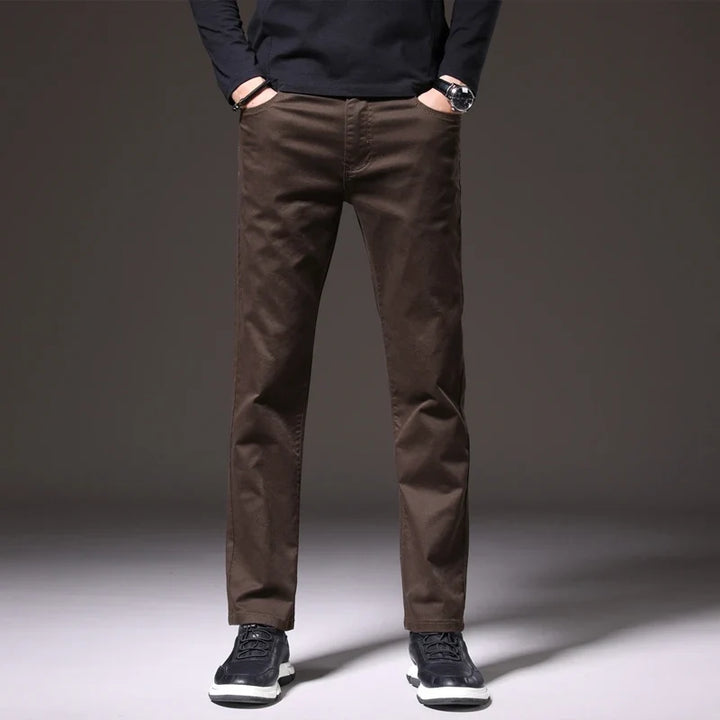 Navy blue men's cotton chinos, comfortable classic fit trousers ideal for versatile casual wear.