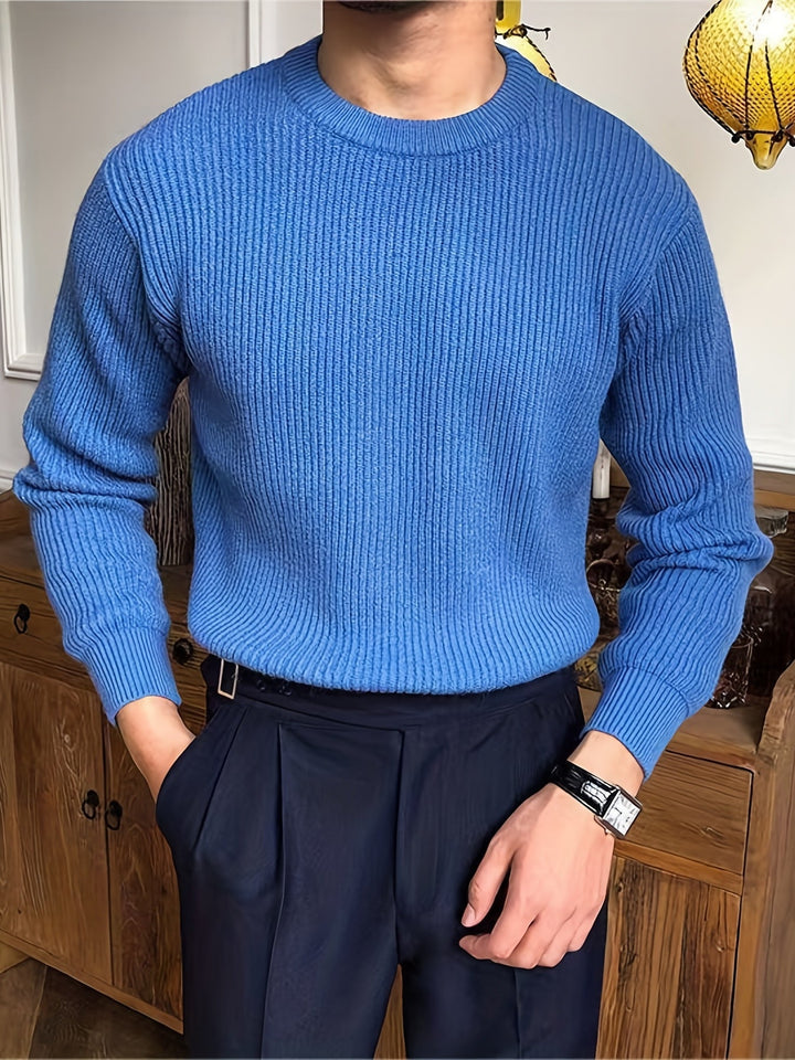 Modern men's knit crew neck sweater, a stylish long sleeve piece for contemporary fall and winter fashion.