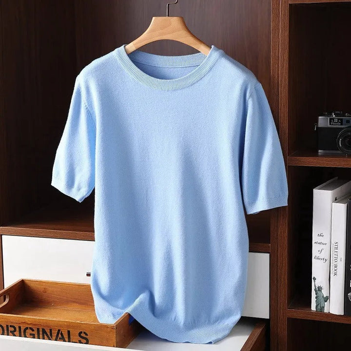 Versatile men's short sleeve crewneck shirt in a solid color, ideal for a casual, stylish everyday look.