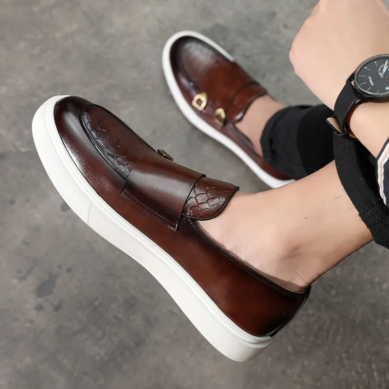 Sophisticated men's croc-embossed loafers, versatile footwear for dressy occasions or smart casual outfits.
