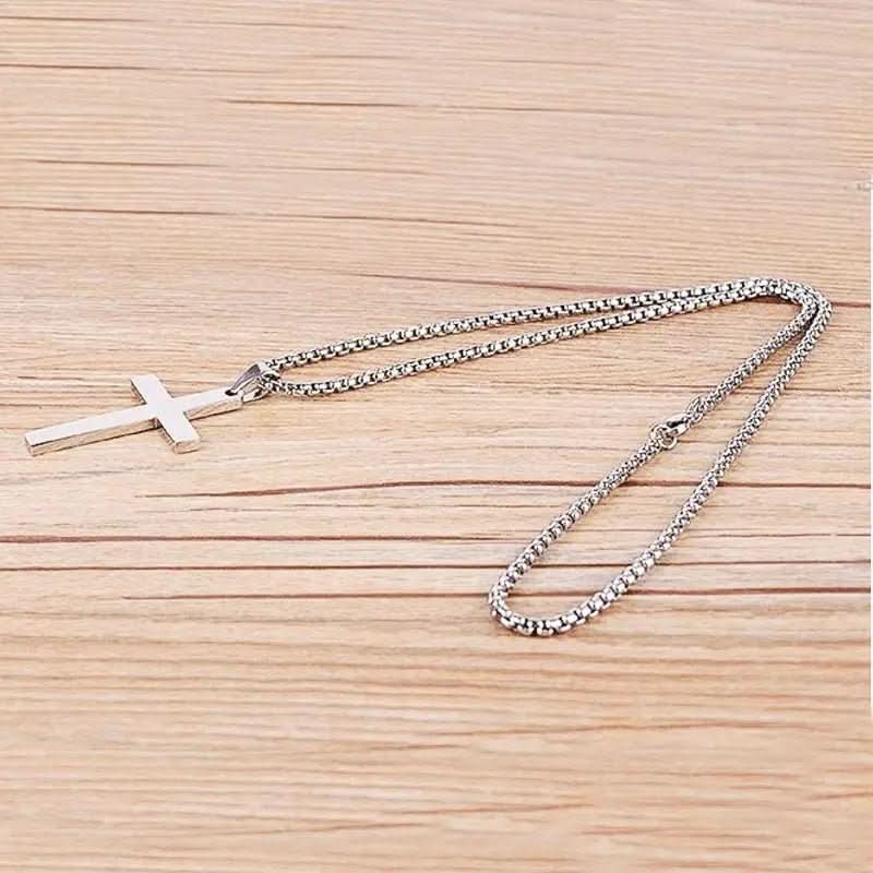 Silver-tone men's cross pendant necklace. Fashionable and spiritual gift for men. Timeless accessory, great for any occasion.