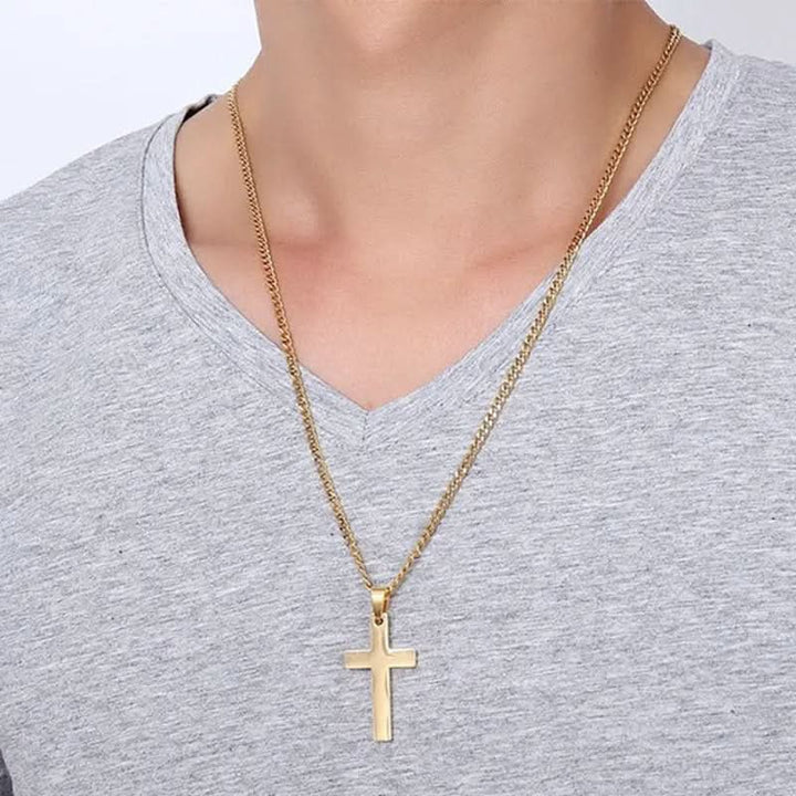 Close-up of a men's classic cross pendant necklace. Detailed religious jewelry, a sleek and elegant accessory for men.