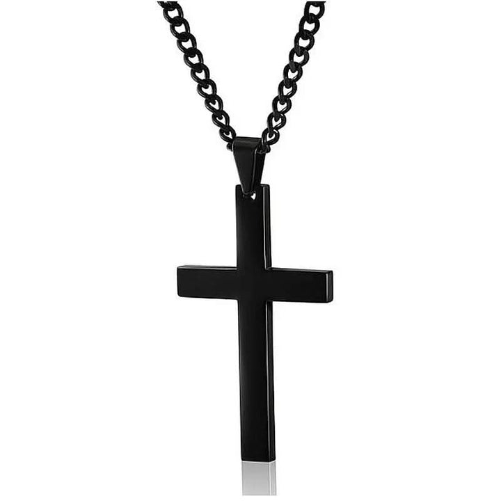 Men's classic cross pendant necklace worn by a man. This sleek and elegant religious accessory enhances any mensfashion.