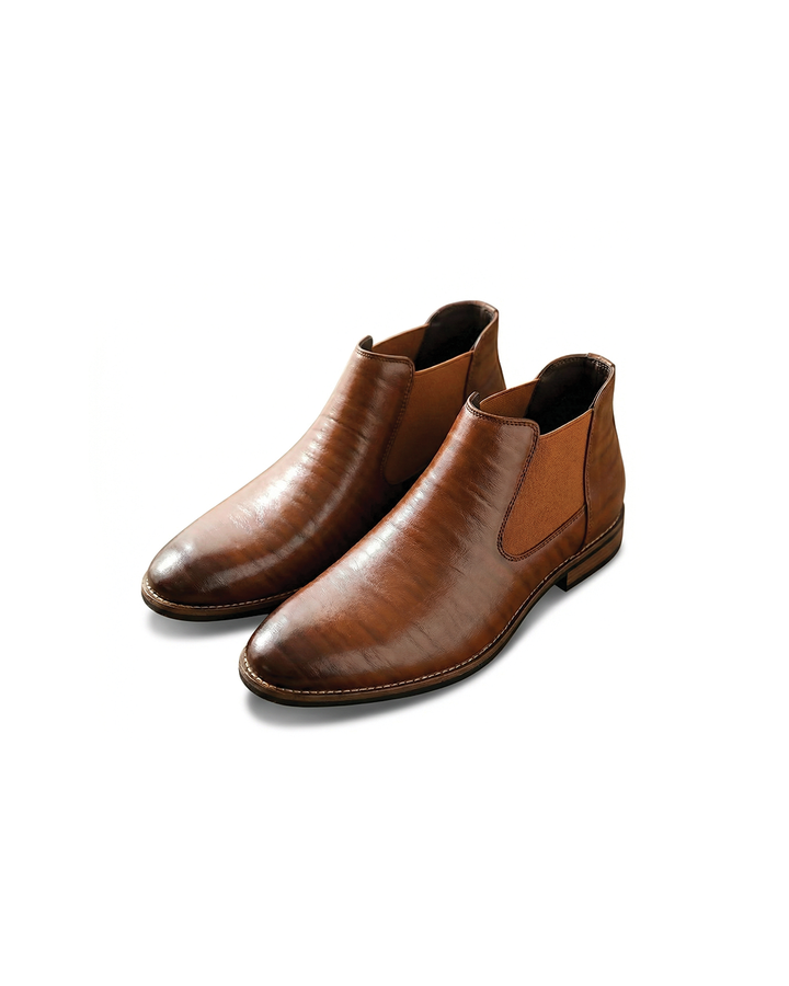 Men's classic dark brown leather Chelsea boots, slip-on style for versatile casual or dress wear.