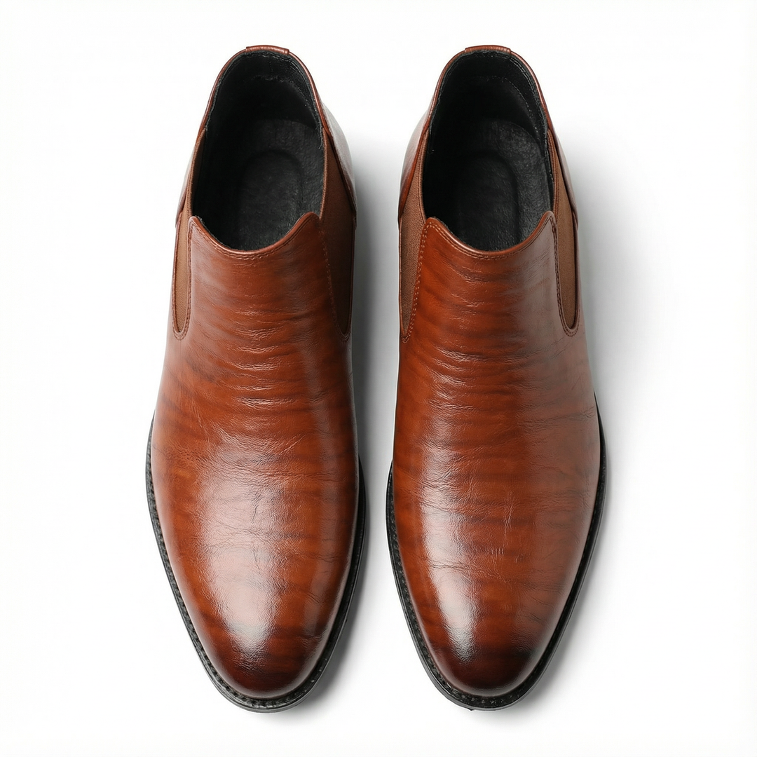 Versatile men's classic dark brown leather Chelsea boots, providing comfort and timeless style.