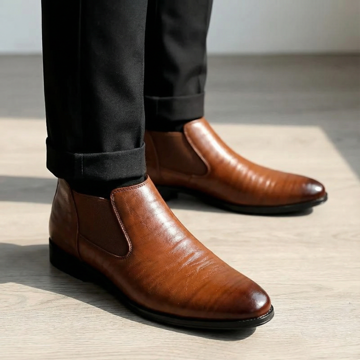 Durable men's classic leather Chelsea boots in a rich dark brown, perfect for versatile fashion.