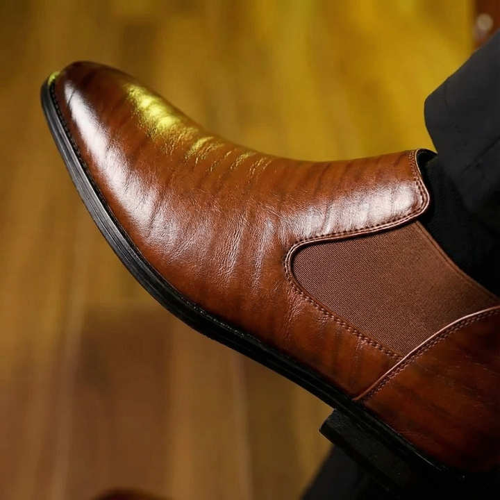 High-quality black leather men's Chelsea boots, a versatile and durable choice for modern style.