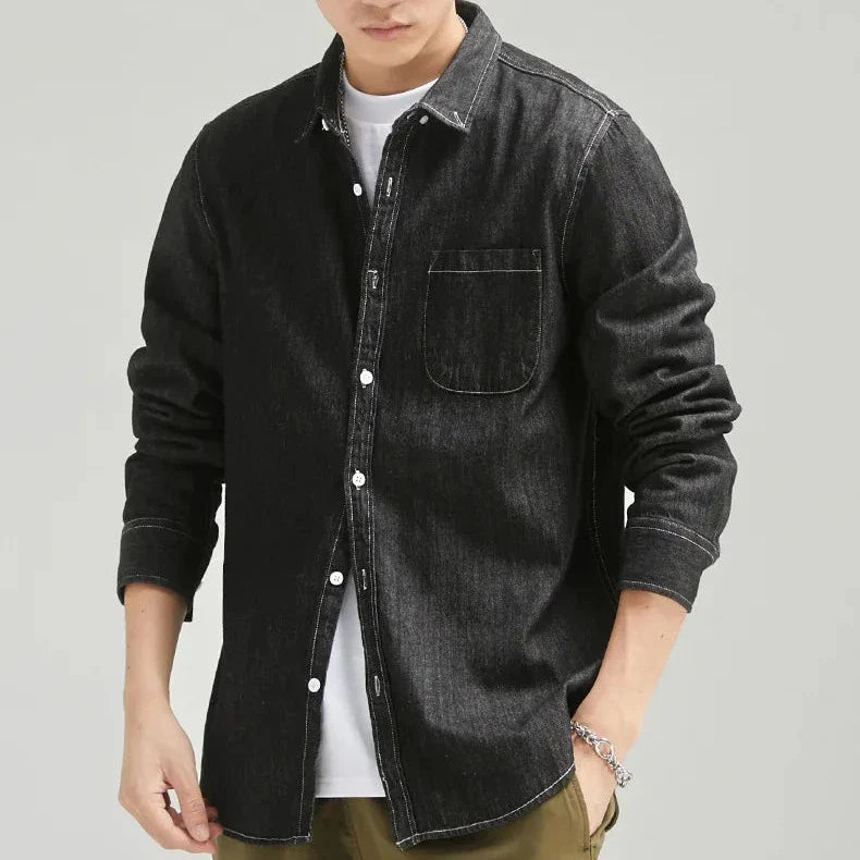 Comfortable men's classic denim button-down shirt, long sleeve, perfect for effortless casual style.