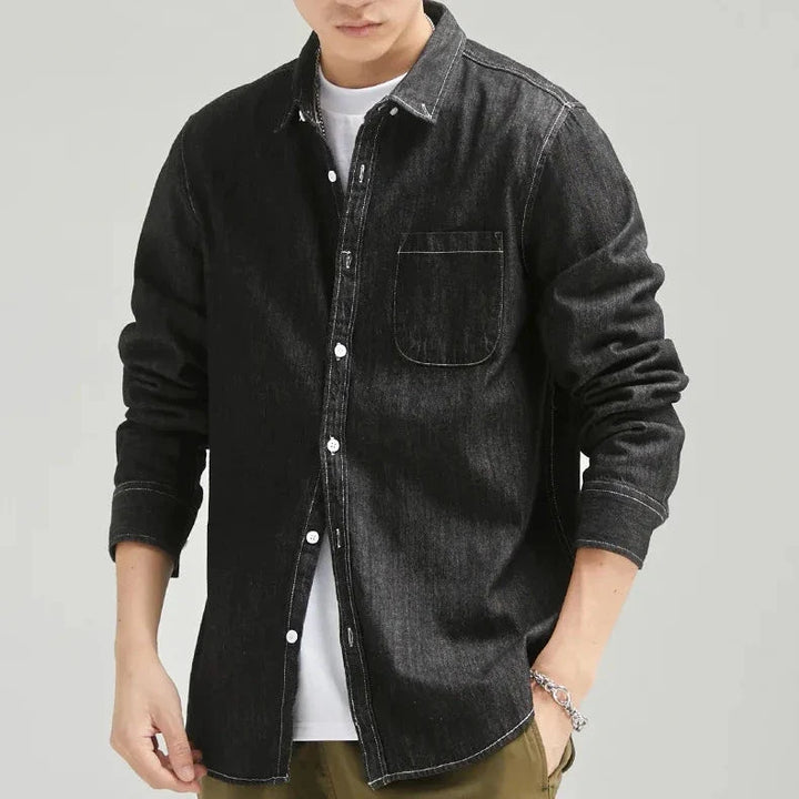 Comfortable men's classic denim button-down shirt, long sleeve, perfect for effortless casual style.
