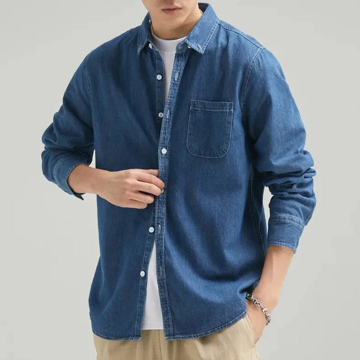 Rugged men's long sleeve denim shirt with a classic fit, perfect for versatile casual fashion.