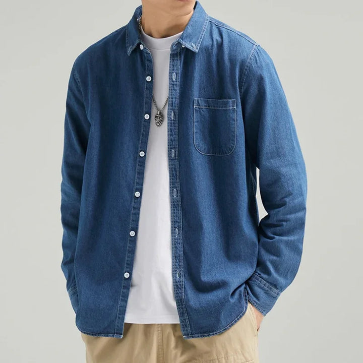 Durable men's denim button-down shirt, long sleeve, ideal for a rugged yet stylish everyday look.