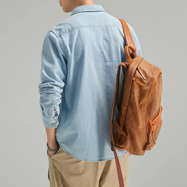 High-quality men's denim button-down shirt, long sleeve, providing rugged style for everyday fashion.