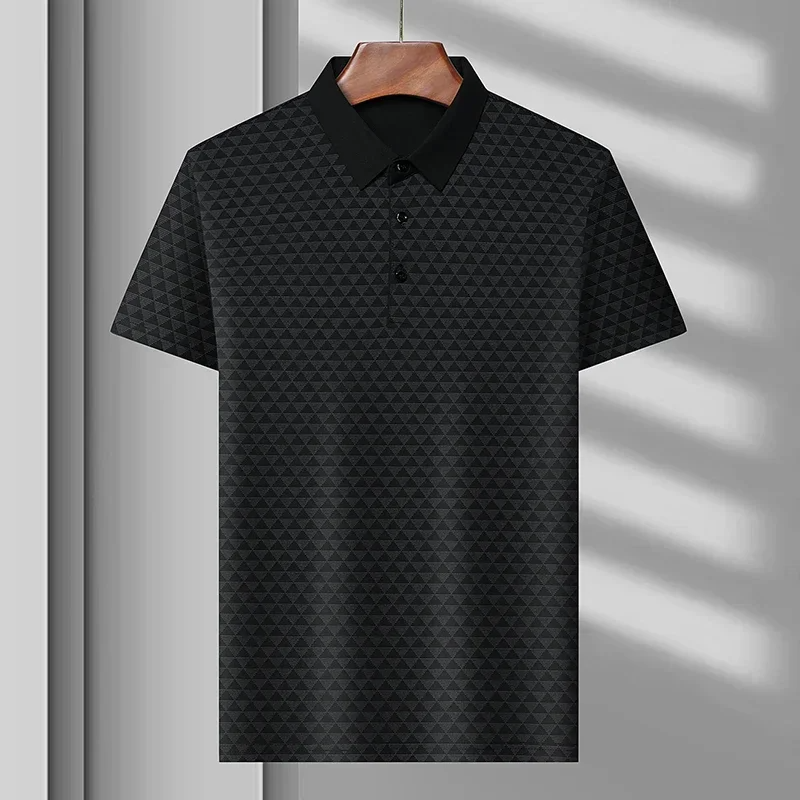 Men's diamond pattern polo shirt styled with jeans, a versatile and classic choice for modern casual fashion.