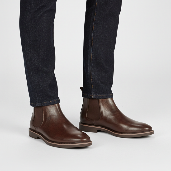 Top-down view of men's leather Chelsea boots, showcasing classic footwear design