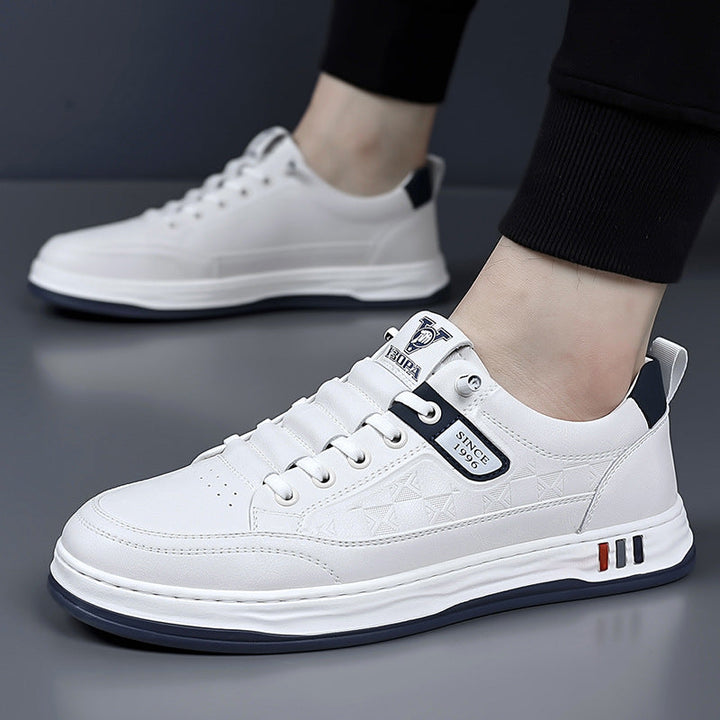 Stylish men's white casual shoes, perfect for comfortable everyday walking.