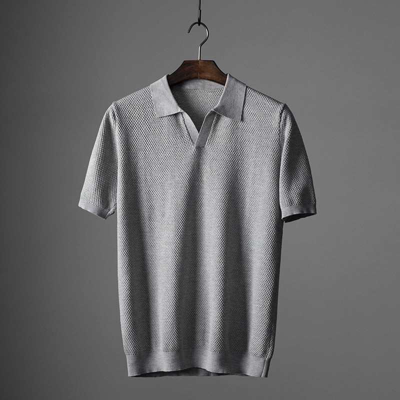 Gray men's classic short sleeve polo shirt, ideal for everyday casual wear, offering comfort and style.