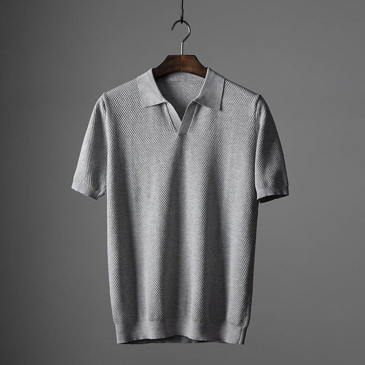 Gray men's classic short sleeve polo shirt, ideal for everyday casual wear, offering comfort and style.