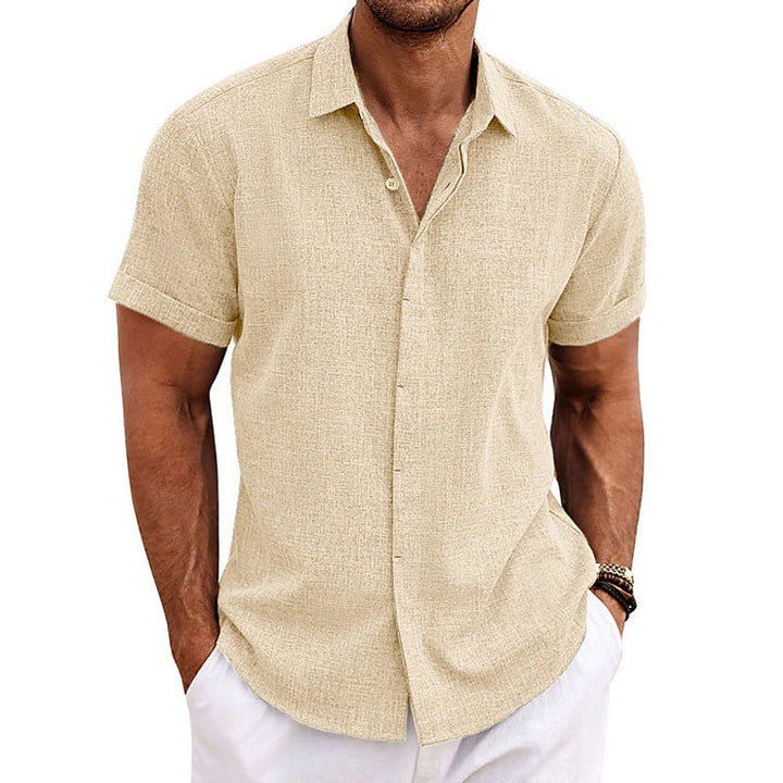 Minimalist men's short-sleeve collared shirt, classic fit. A versatile summer top for casual everyday wear.