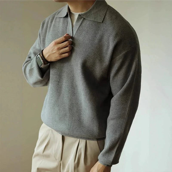 Soft, breathable knit polo shirt for men, offering comfort & style in a classic fit.