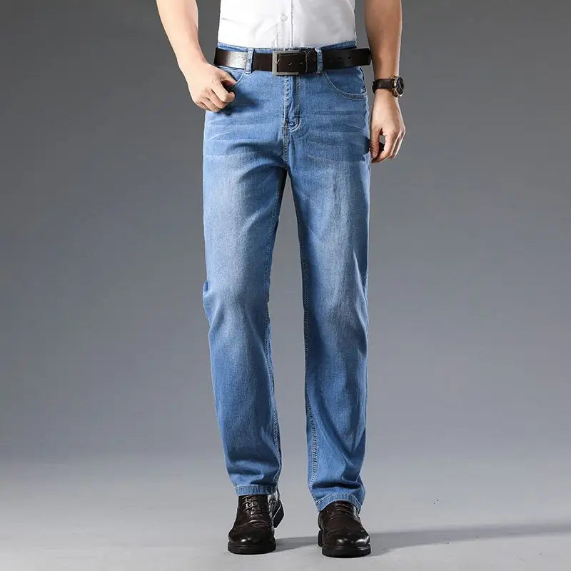 Man wearing classic fit blue stretch denim jeans, showcasing comfortable and stylish everyday fashion.